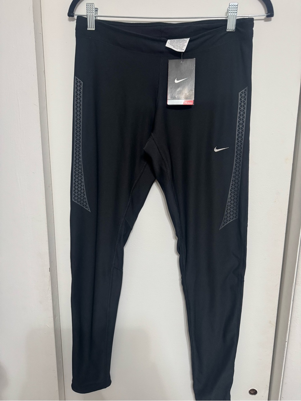 Nike Black Women's Dri-FIT Top with Reflective Geometric Accent